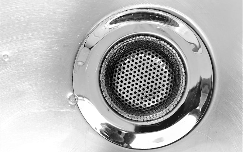 Close-up of a sink drain for professional cleaning services
